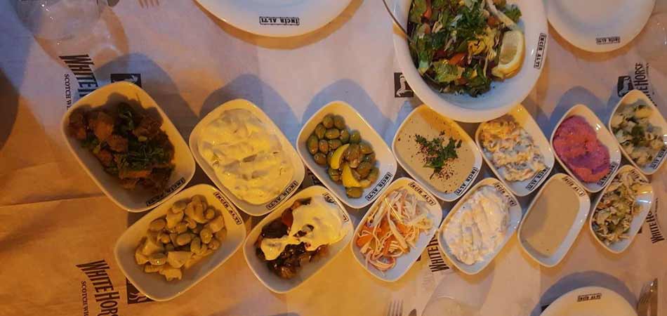 A wide spread of meze is served