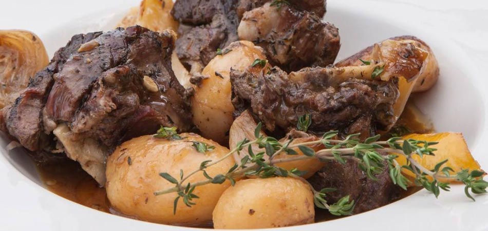 Slow-cooked lamb with poatotoes, a traditional Cypriot dish