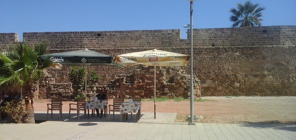 Parasols and tables outside near Sea Gate, Famagusta